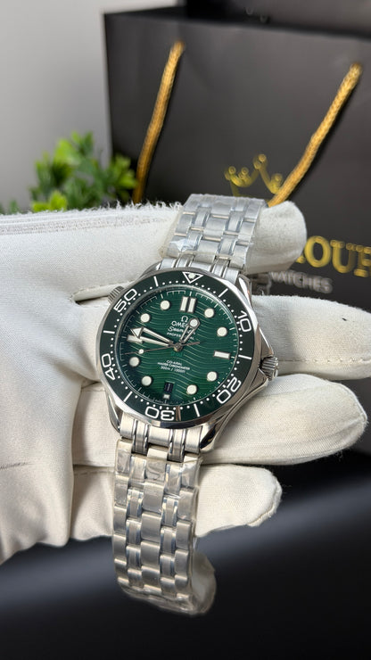 Silver with Green Dial.