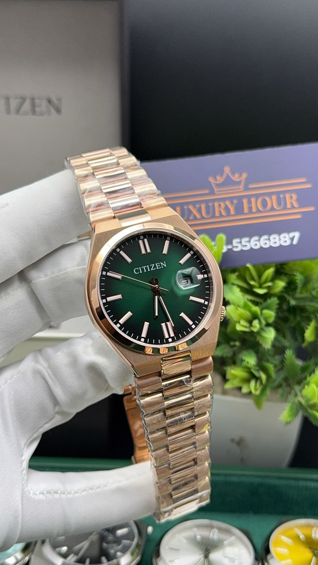 Rose gold with green dial