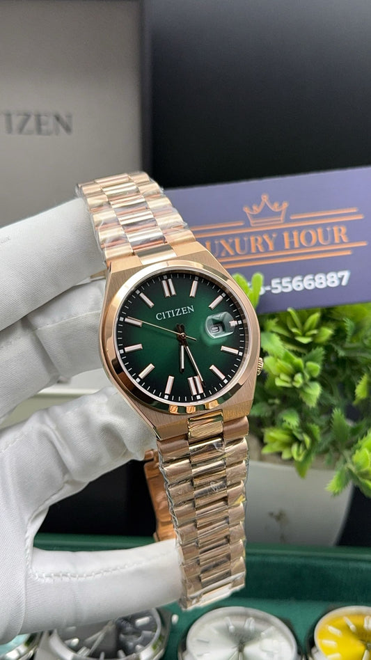 Rose gold with green dial