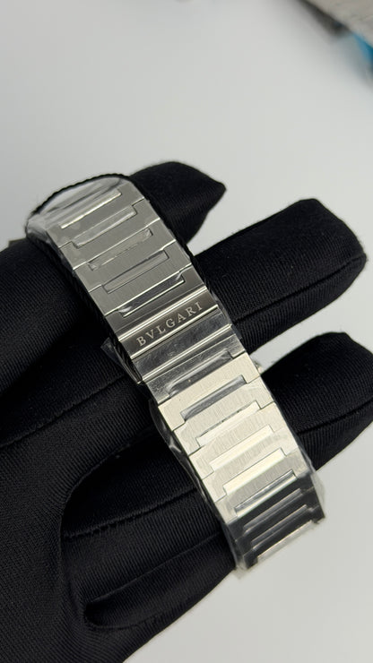 Silver with Aqua Dial.
