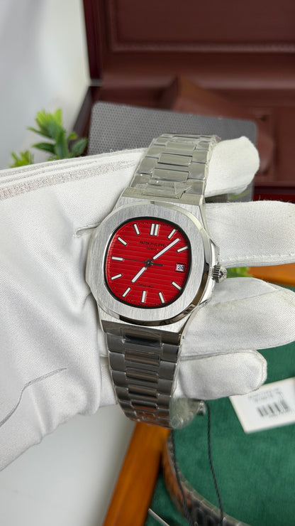 Silver with Red Dial.