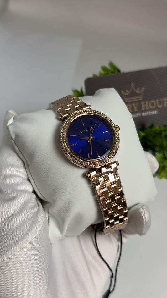 Rose Gold with Dark Blue Dial.