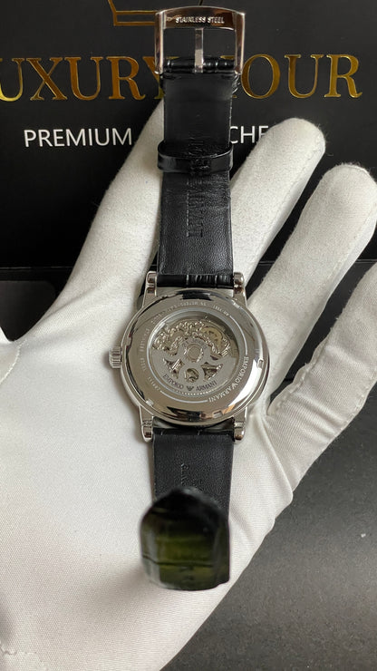 Silver with Skeleton Dial.