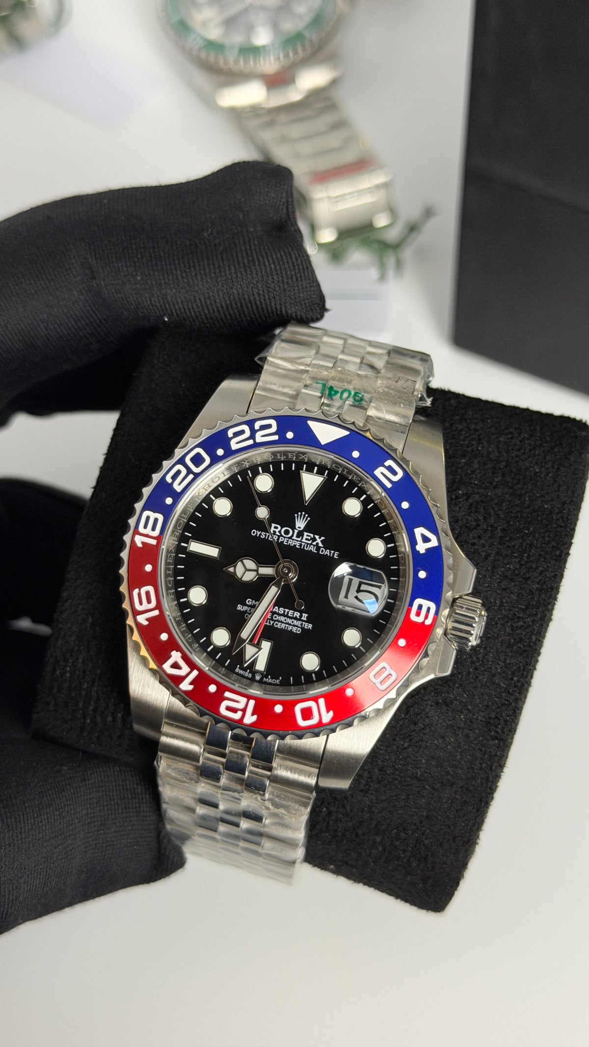 Silver With Black Dial.
