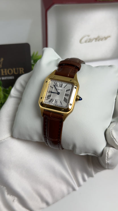 Yellow Gold with Brown Strap.