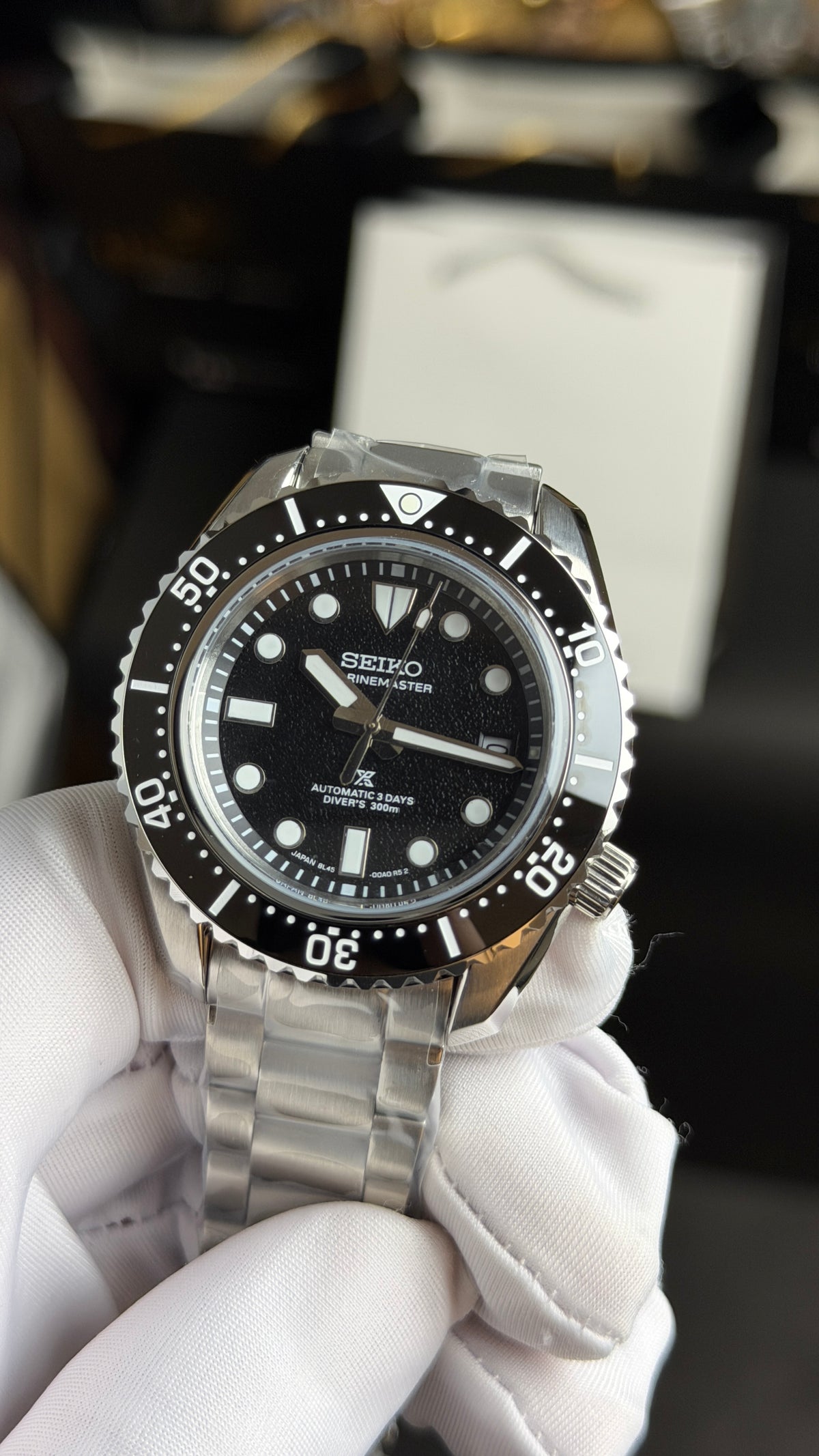 Silver with Black Dial.