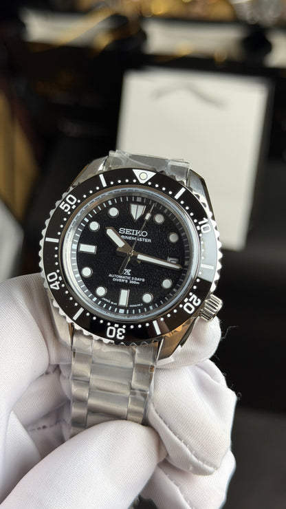 Silver with Black Dial.