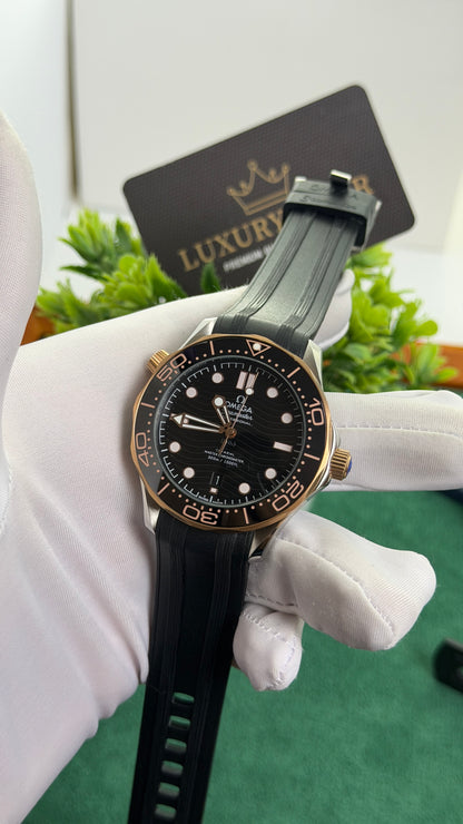 Rose Gold with Black Dial.