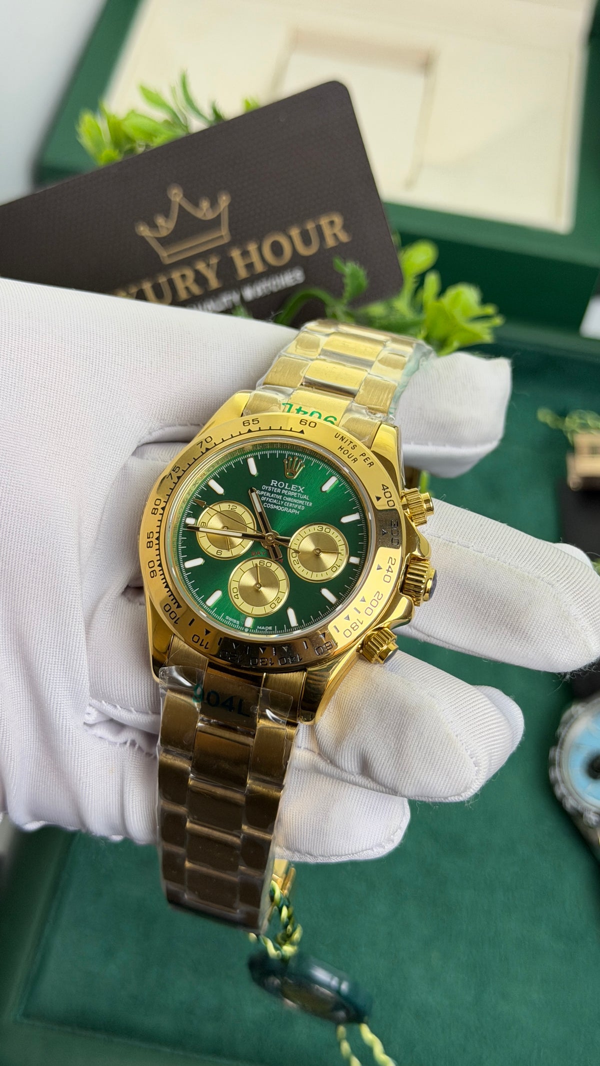 Yellow Gold with Green Dial.