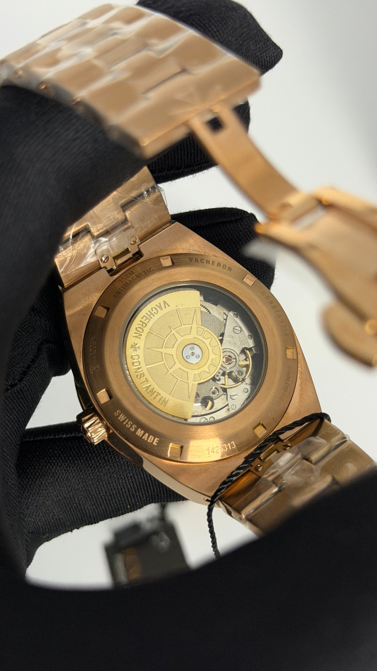 Rose Gold with Green Dial.