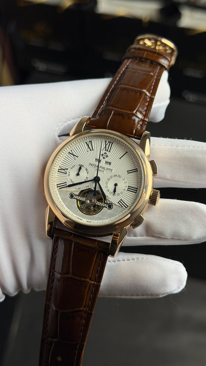 Rose Gold with White Dial.