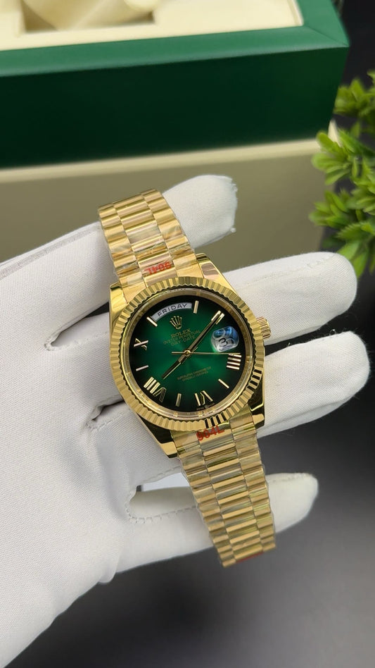 Yellow gold with green dial
