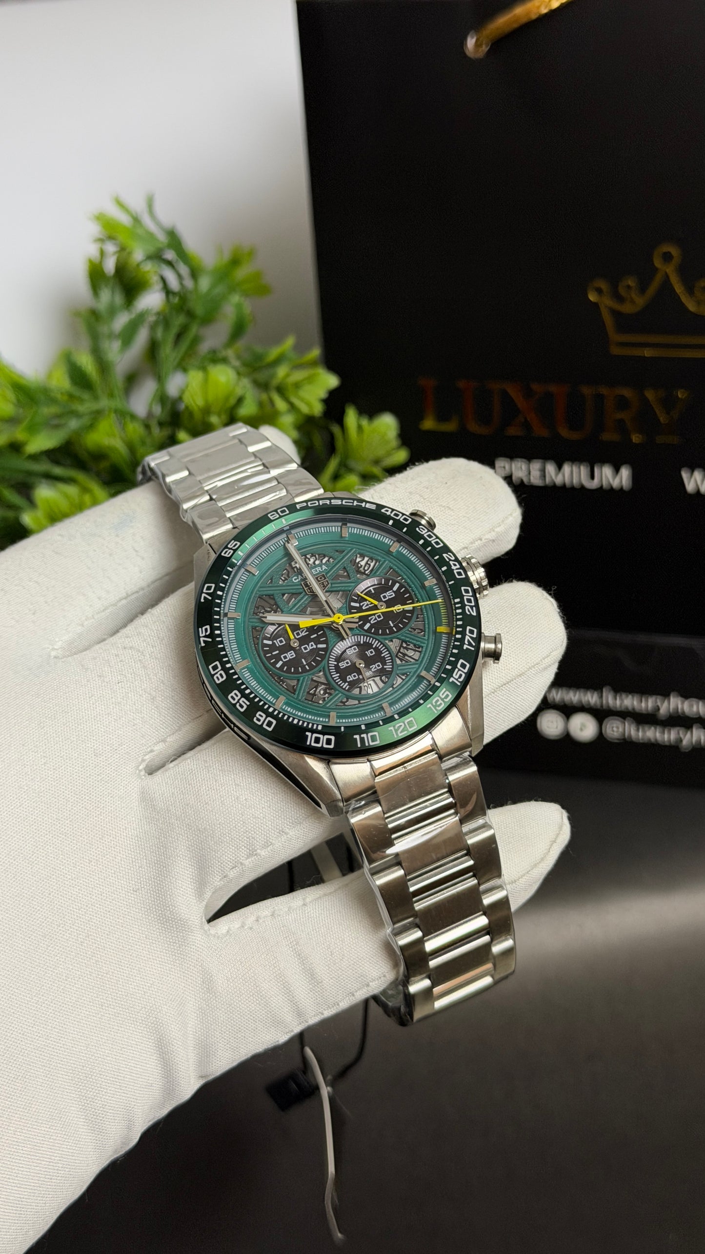 Silver with Green Dial.