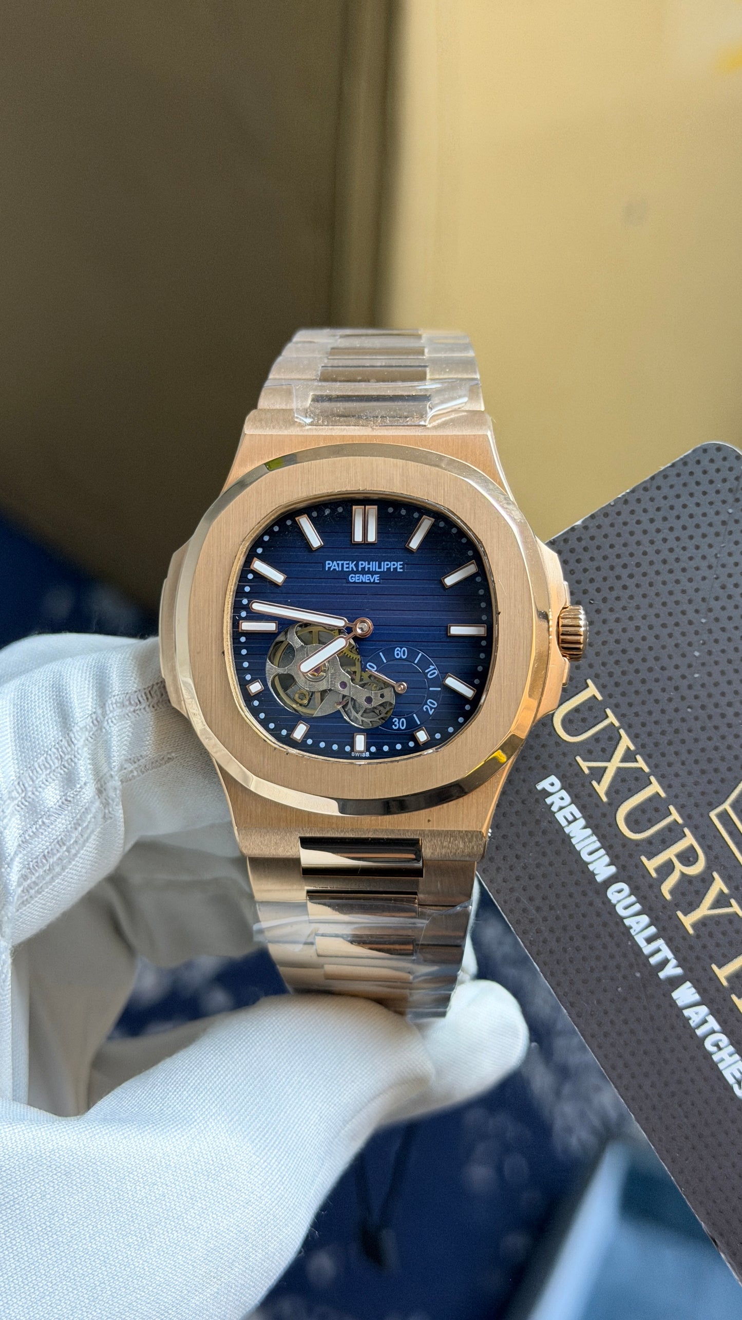 Rose Gold with blue Dial.
