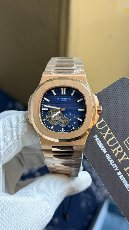Rose Gold with blue Dial.