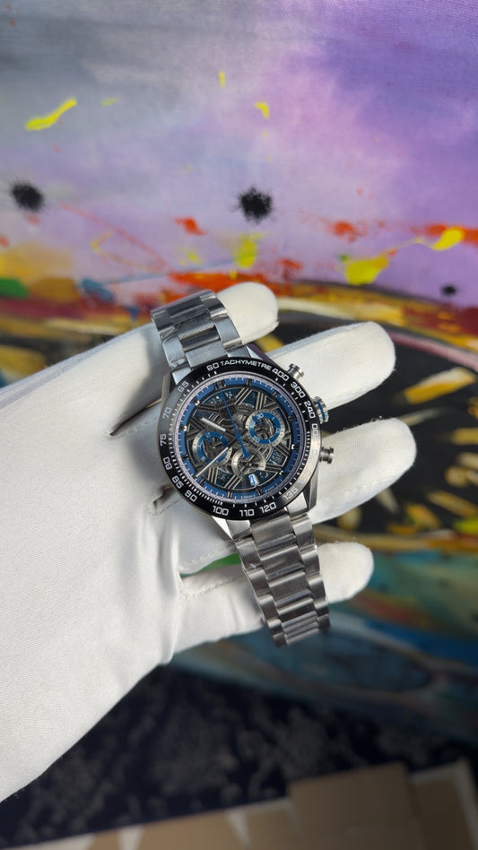 Silver with blue dial