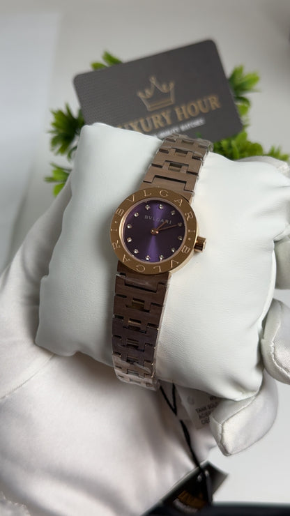 Rose Gold with Purple Dial.