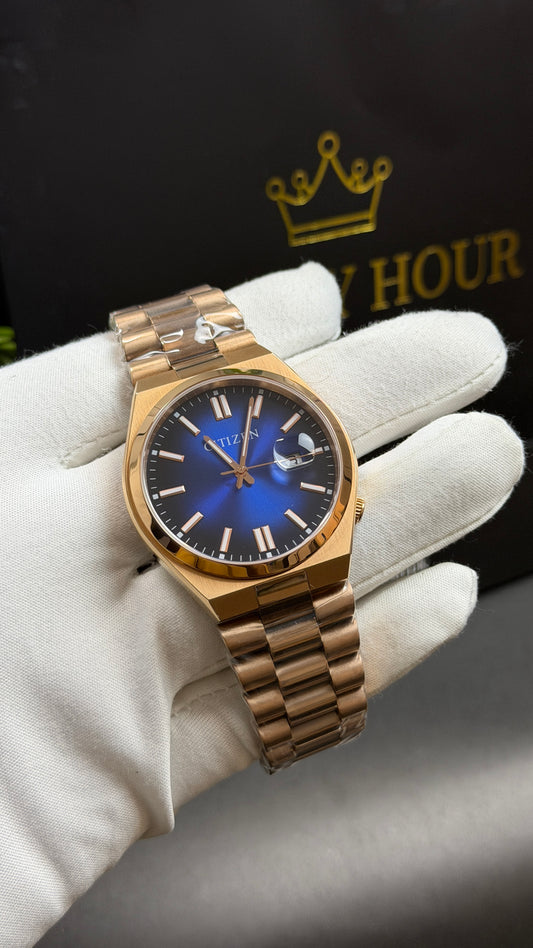 Rose Gold with Aqua Dial.