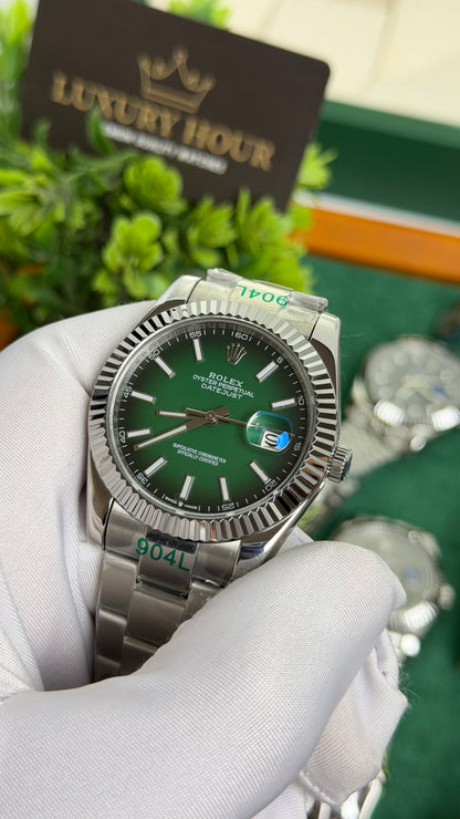 Silver with Green Dial.