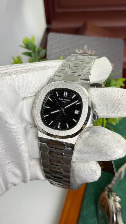 Silver with Black Dial.
