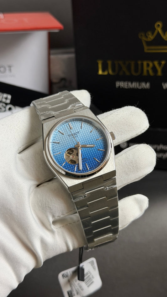 Silver with Sky Blue Dial.