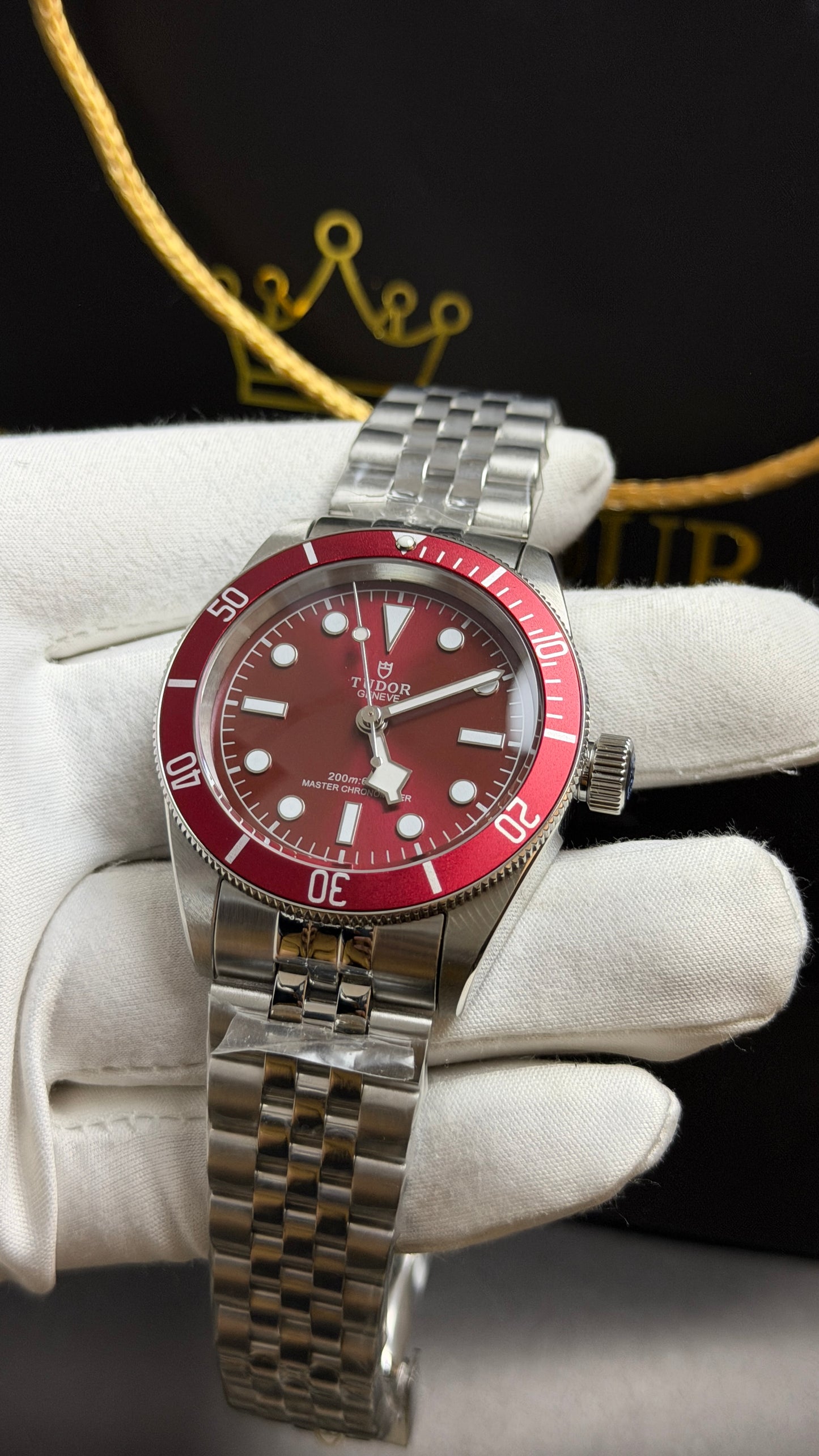Silver with Maroon Dial.