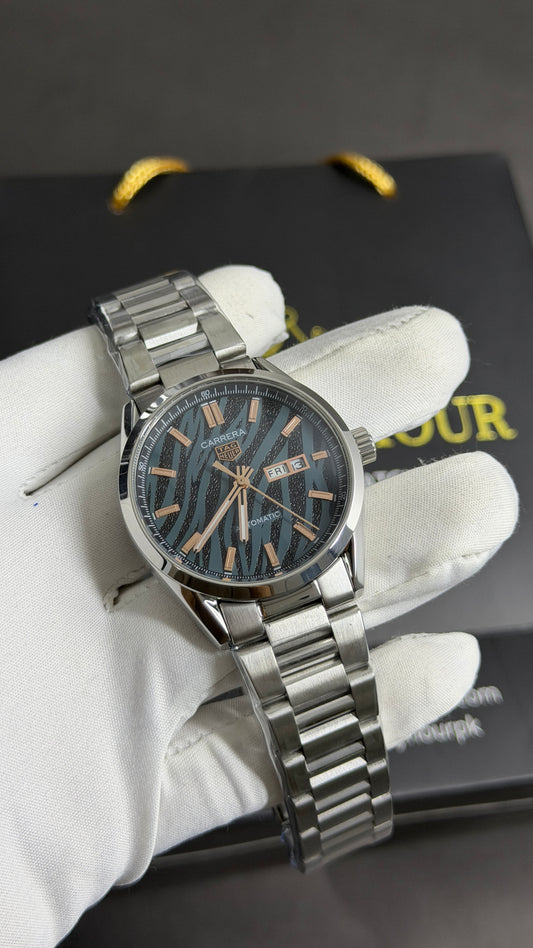 Silver with Tiger Dial.