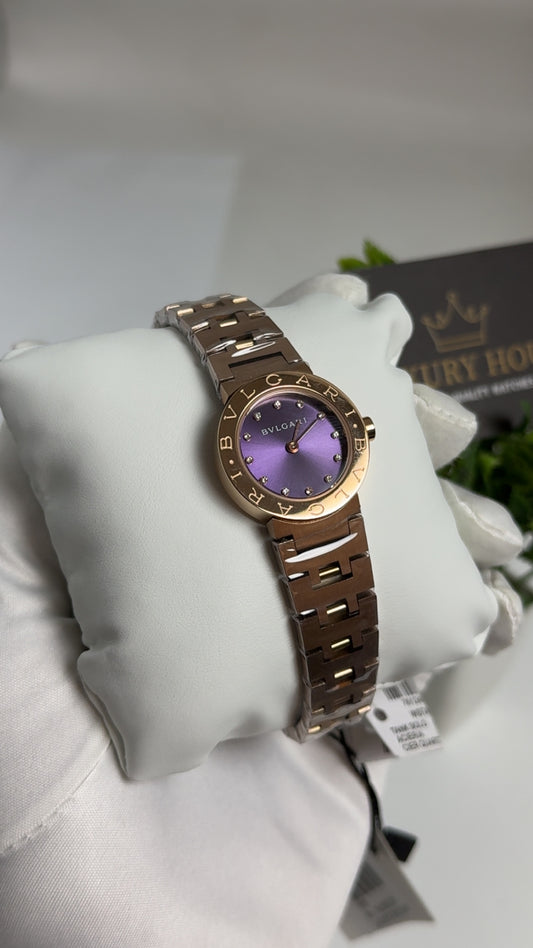 Rose Gold with Purple Dial.