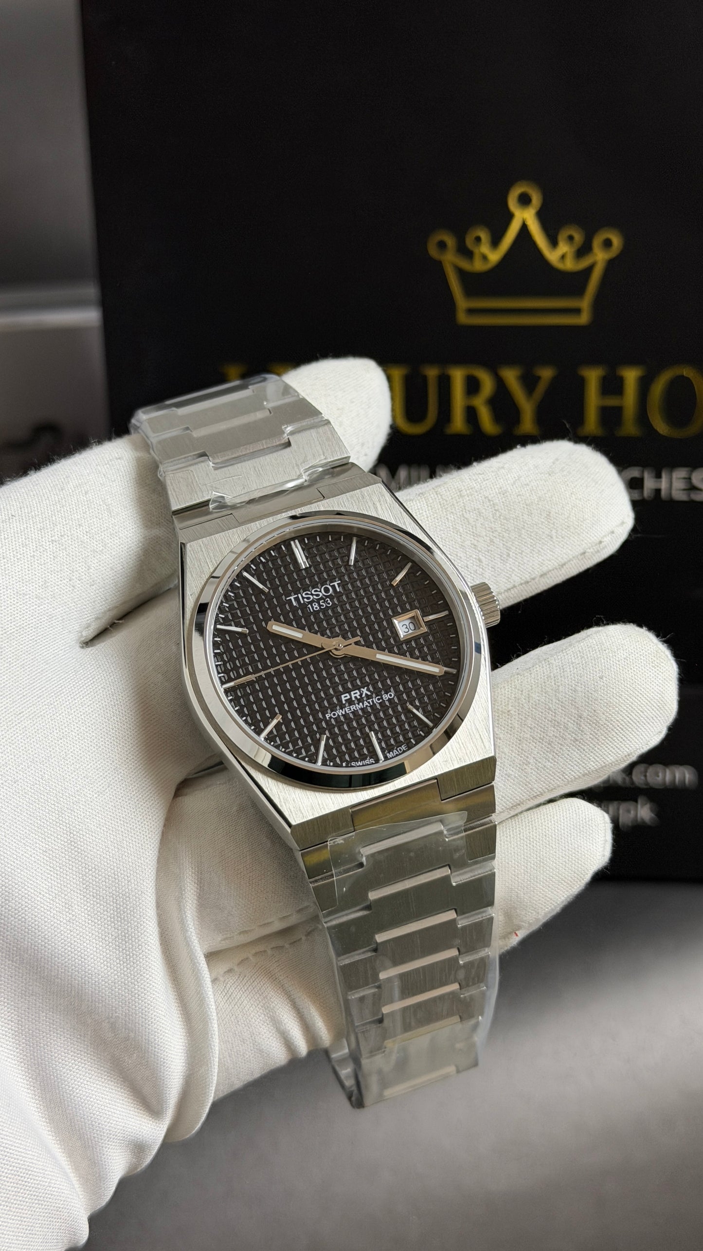 Silver with Black Dial.
