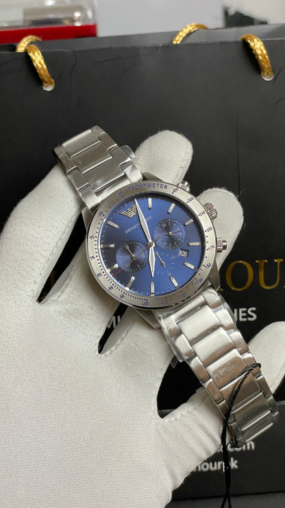 Silver with Blue Dial.