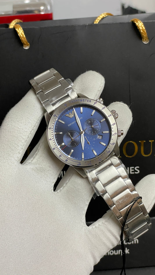 Silver with Blue Dial.