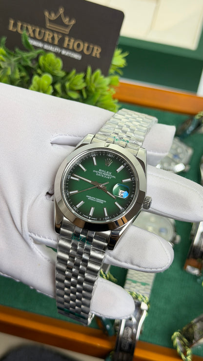Silver with Green Dial.