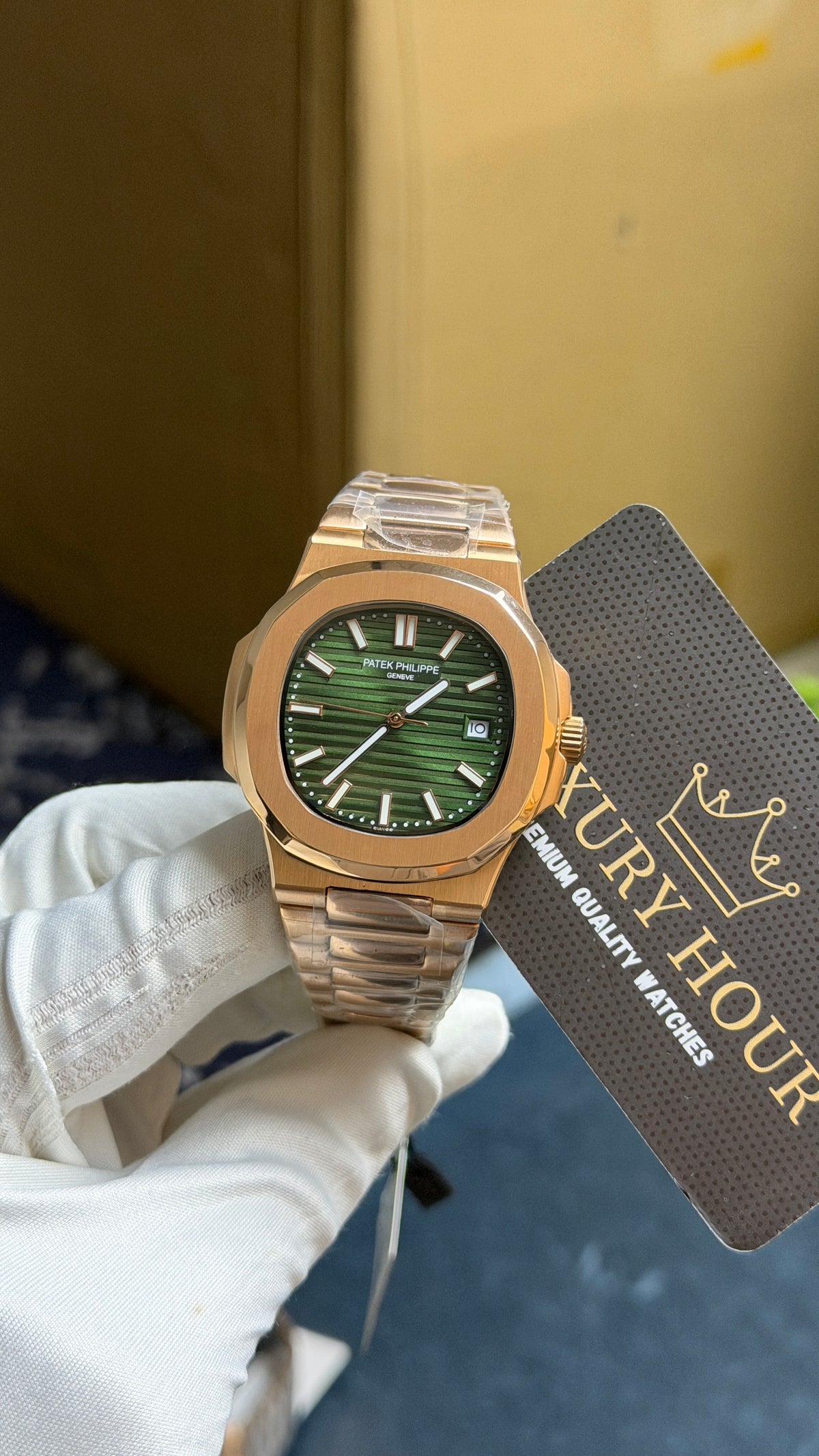 Rose Gold with Green Dial.