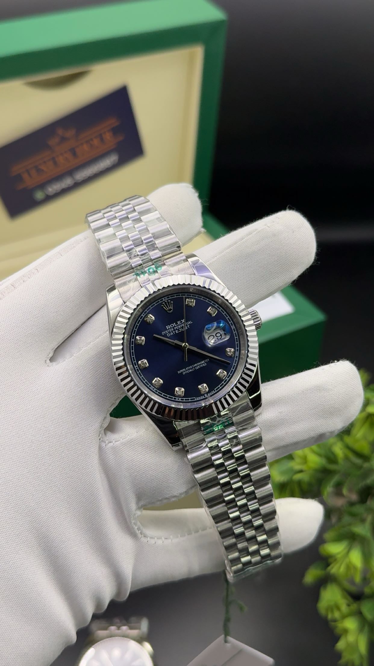 Silver with blue dial