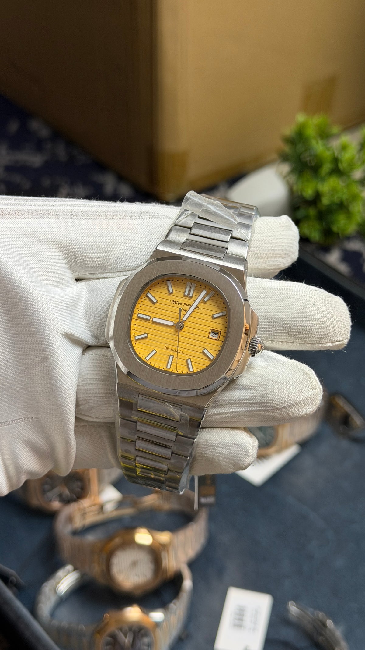 Silver with Yellow Dial.