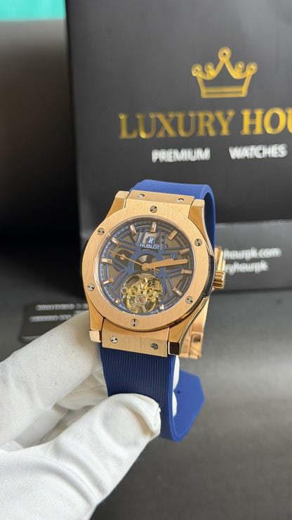 Rose Gold with Blue Skeleton Dial.