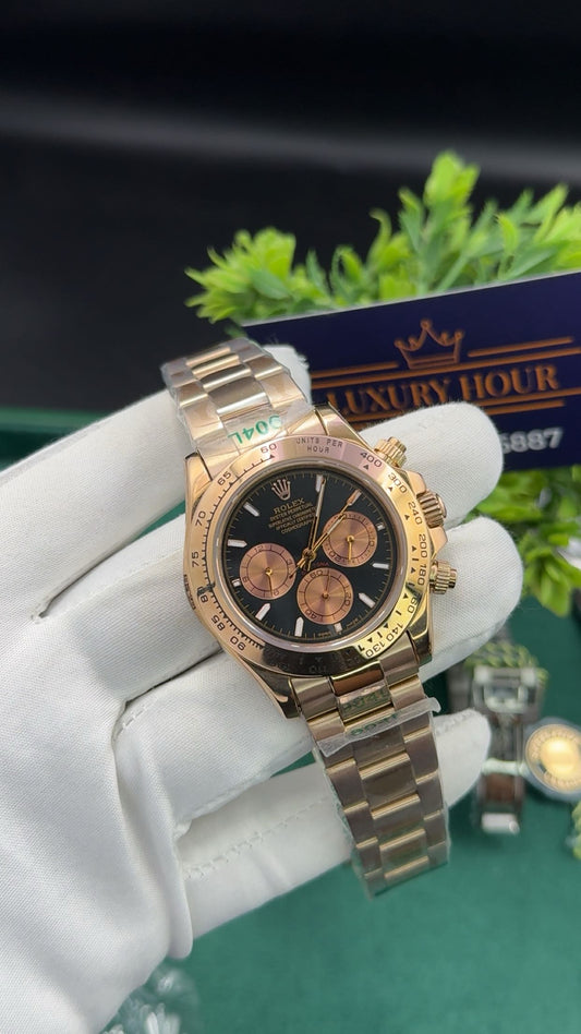 Rose gold with black dial
