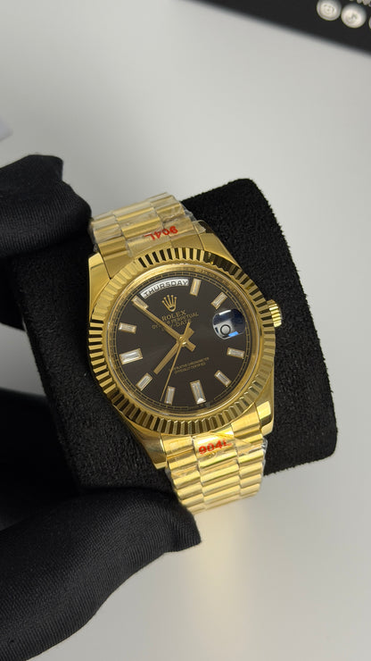 Yellow Gold with Black Dial.