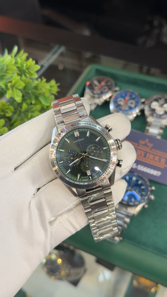 Silver with green dial