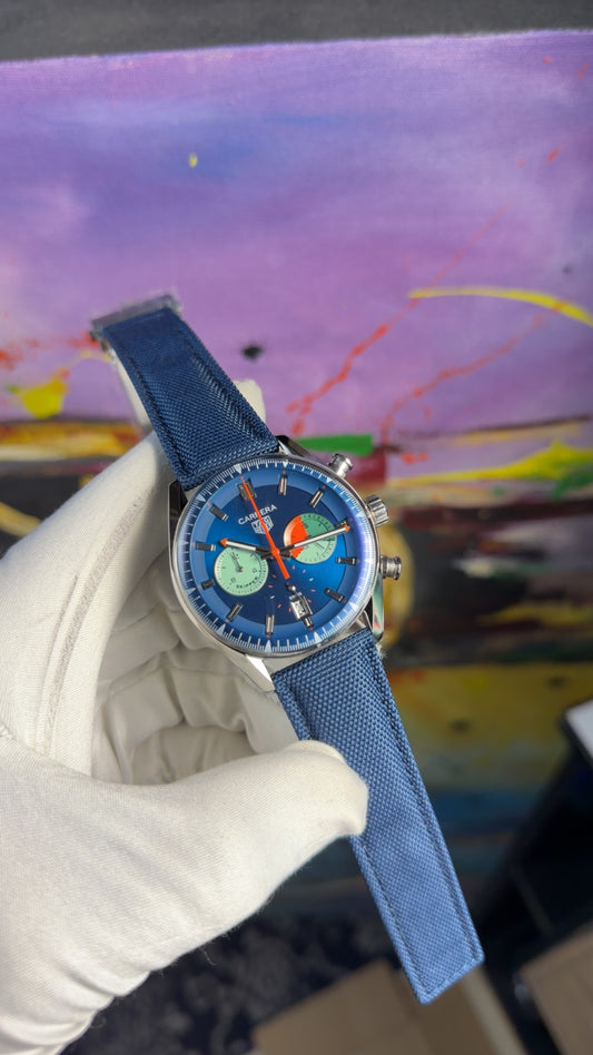 Silver with blue dial