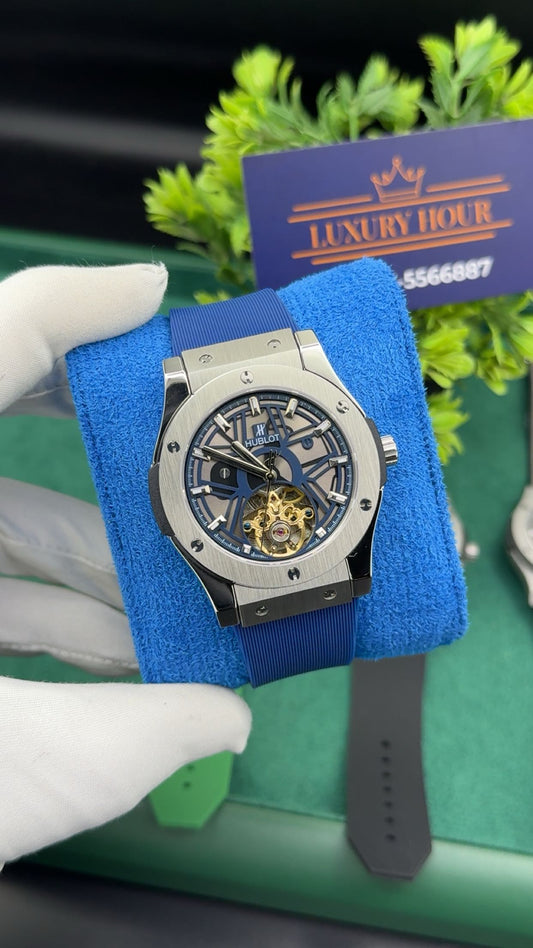 Silver with blue dial