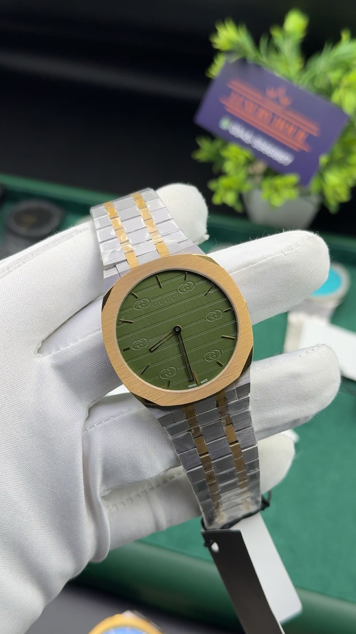 Yellow gold two tone with green dial