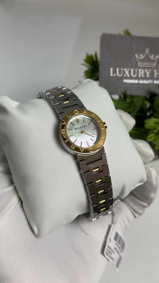 Yellow Gold Two Tone with White Dial.