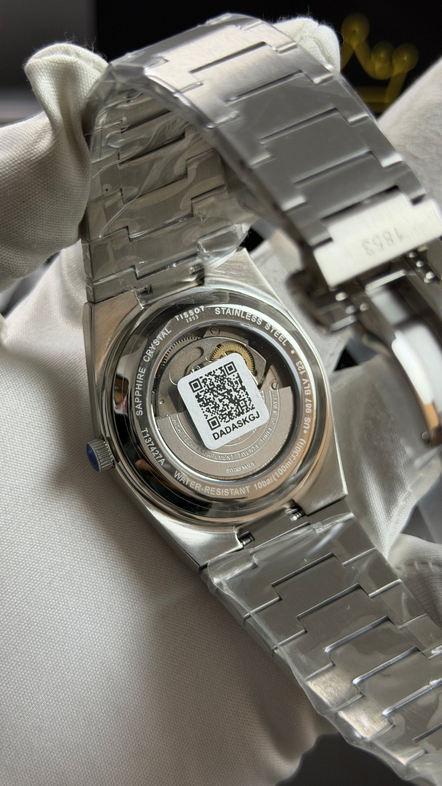 Silver with Green Dial.