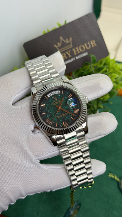 Silver with Green Galaxy Dial.