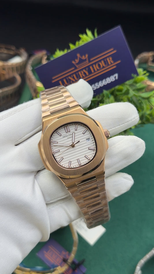 Rose gold  with white dial
