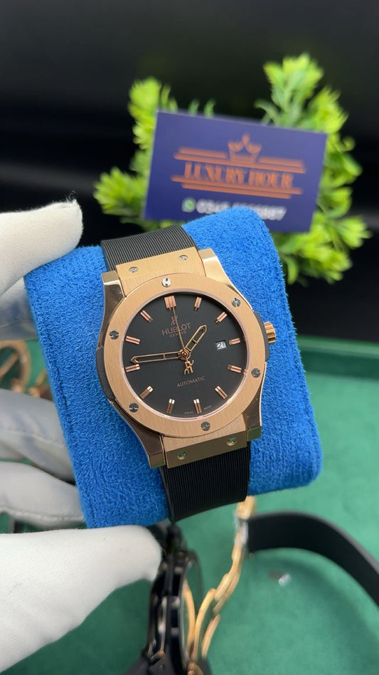 Rose gold with black dial