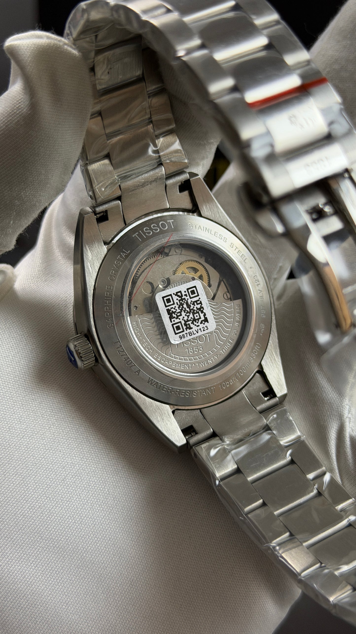 Silver with Green Dial.