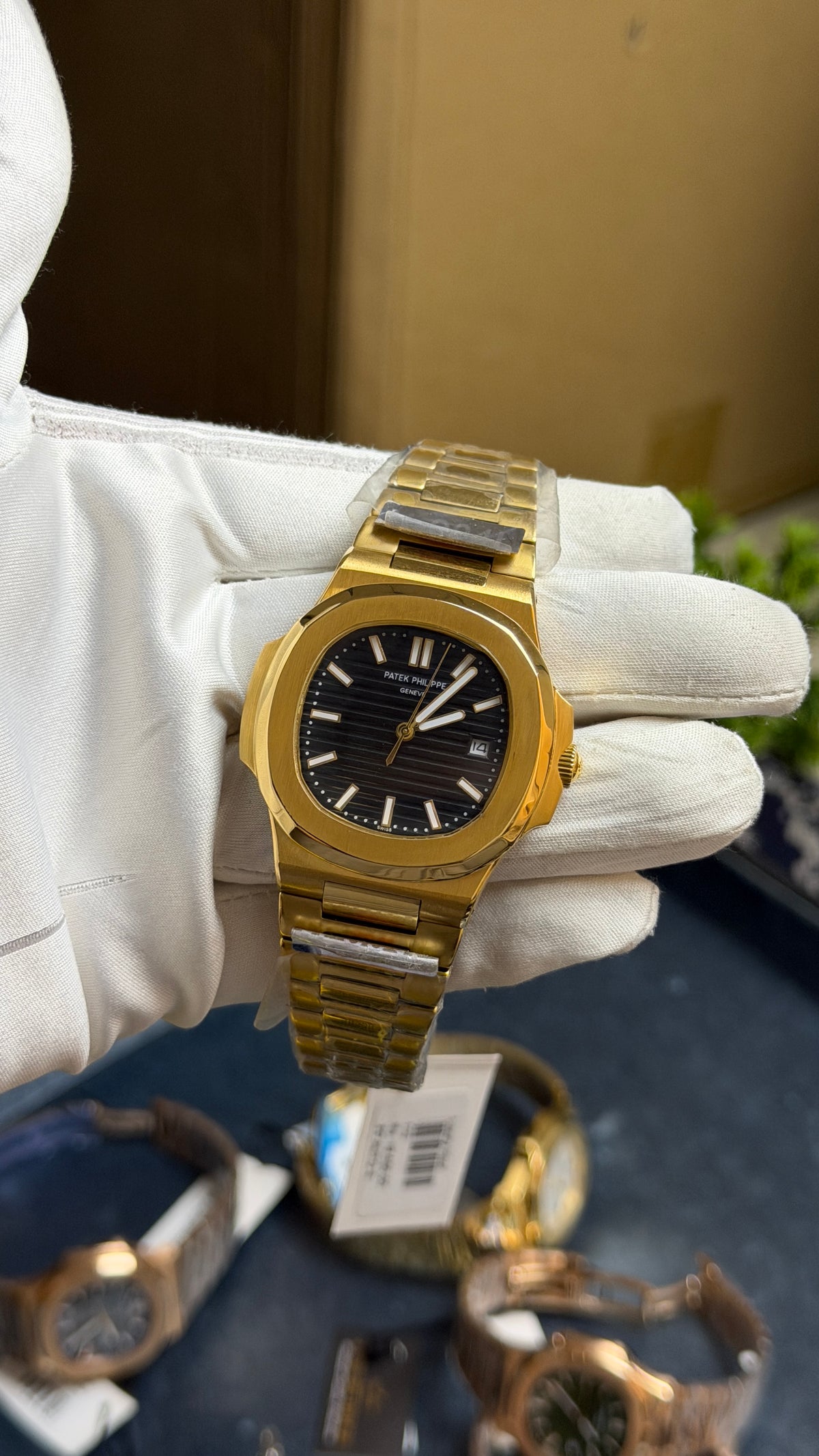 Yellow Gold with Black Dial.