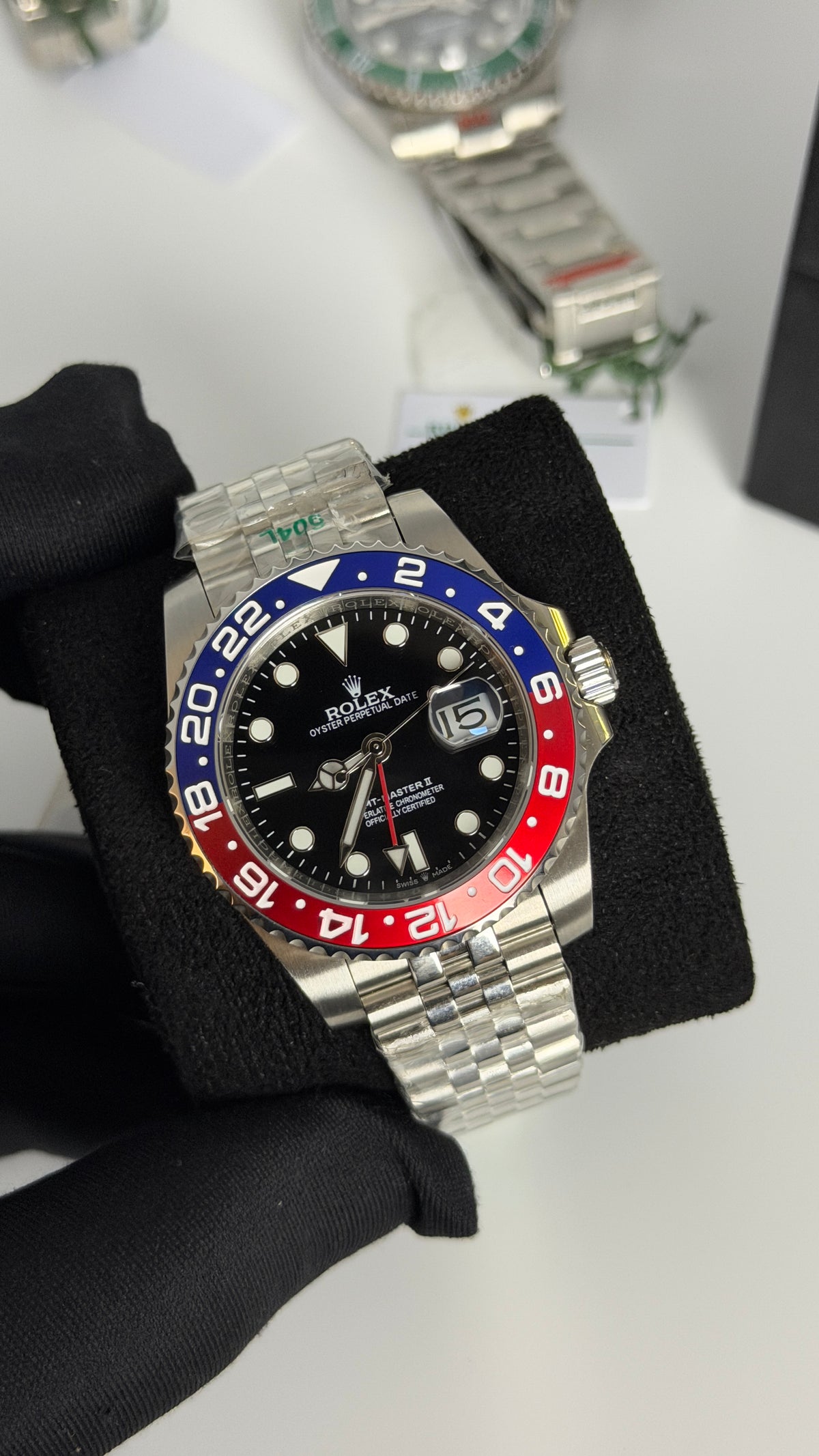 Silver With Black Dial.